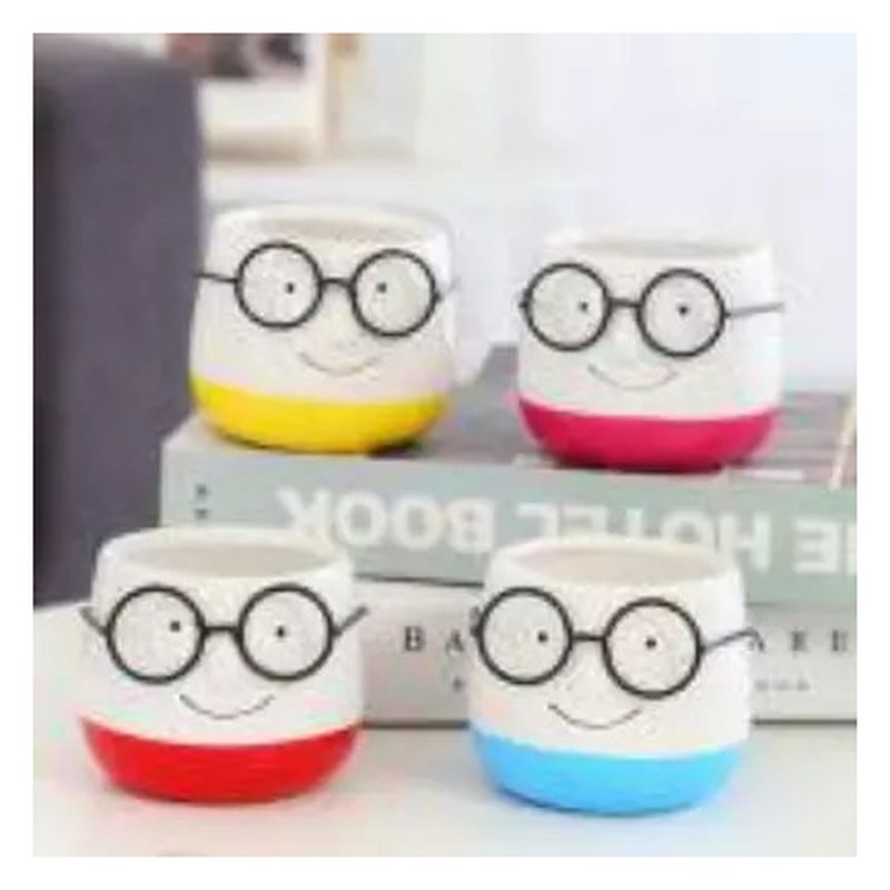 Smiley face ceramic pot with glasses