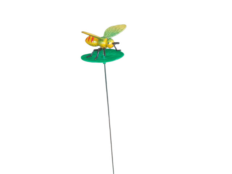 Dragonfly on leaf garden stake