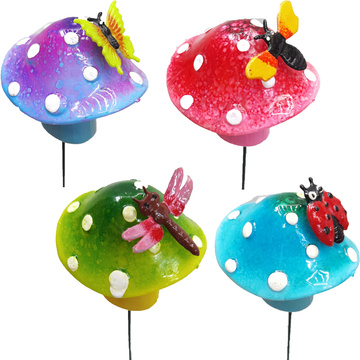 Spotted mushroom garden stakes